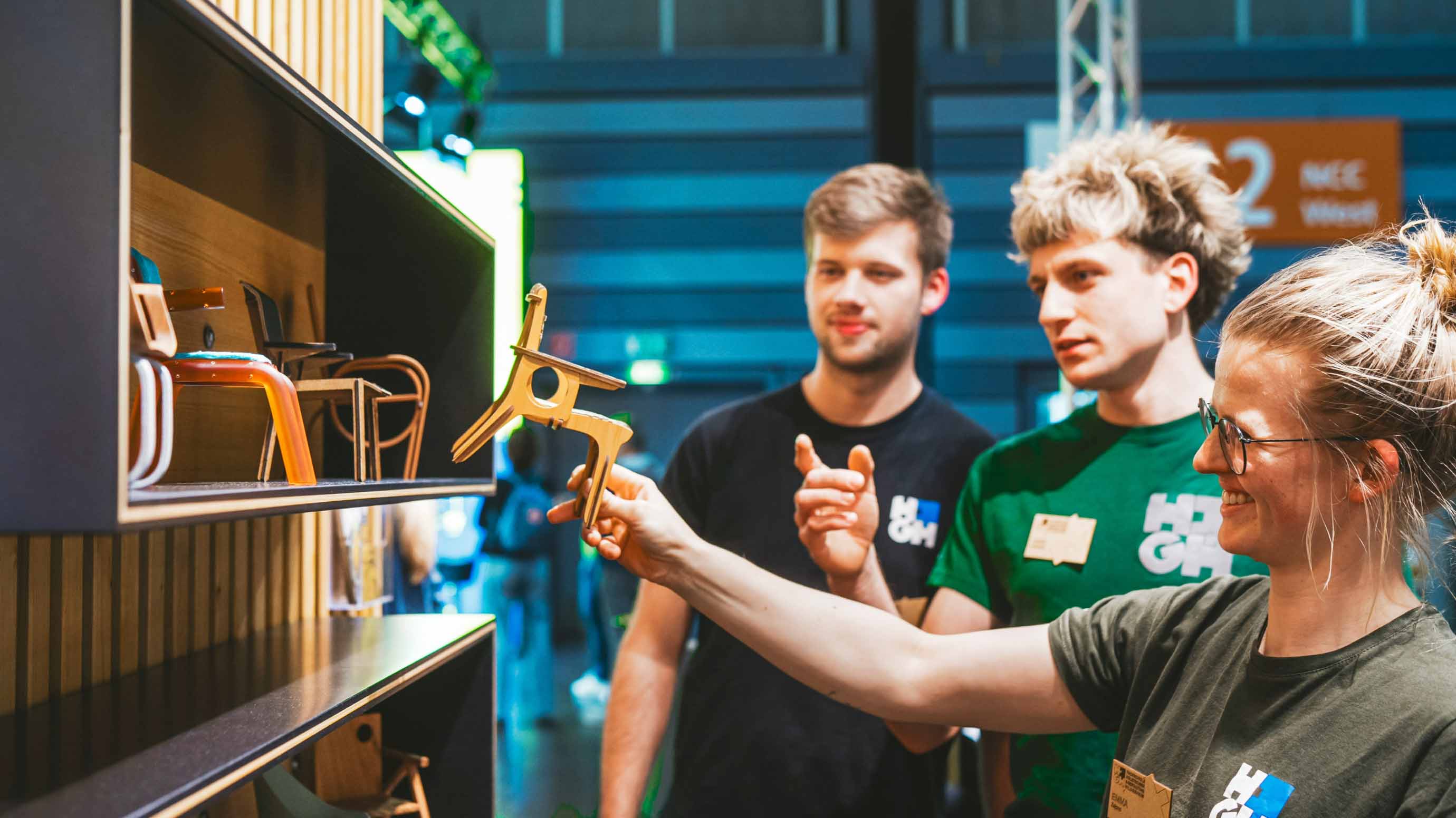 People looking at woodwork elements